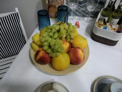 a bowl of fruit on top of a counter at Marinos Suites in Chania Town