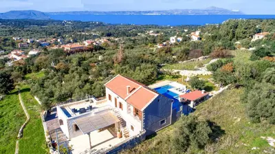 an aerial view of a house on a hill at Cretan Lux Villa Heated Pool in Gavalochori