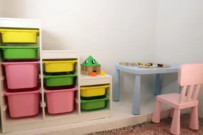 a toy room with a table and a chair at Daphne's house Families Only in Chania Town