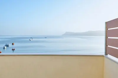a view of the ocean from a balcony at Seaside House in Kissamos
