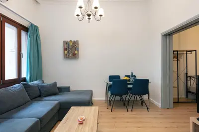 a living room with a couch and a table at Centro Storico in Chania Town