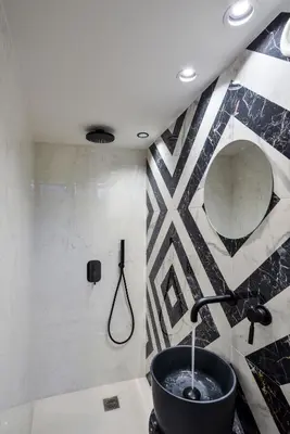 a bathroom with a black sink and a shower at Neorion Living in Chania Town
