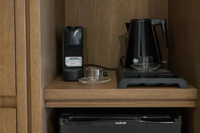 a coffee maker sitting on top of a counter at SanSal Boutique Hotel in Chania Town