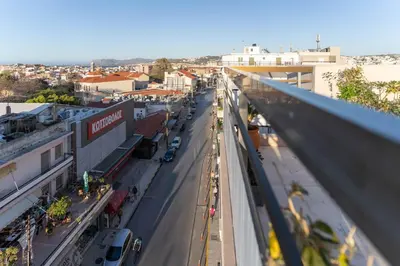 an overhead view of a city street with cars at Helios Residence in Chania Town
