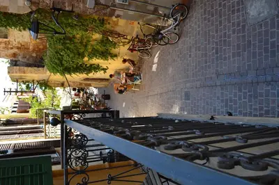 a stove top in a kitchen with a brick wall at Antica Casa Studios in Chania Town