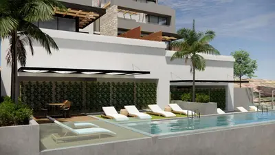 a house with a swimming pool with lounge chairs at Amphitheatre Suites in Palaiochóra