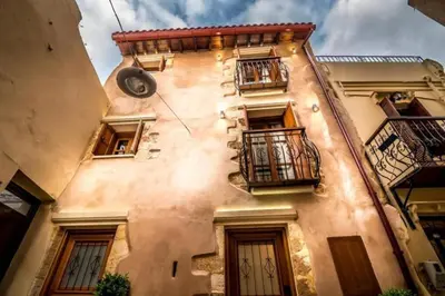 a building with balconies on the side of it at Casa Bene in Chania Town