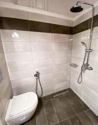 a bathroom with a toilet and a shower at Casa Dasyra in Chania Town