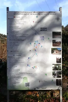 a sign for the interpretive sign at the top of a mountain at Kleanthi's House in Chania Town