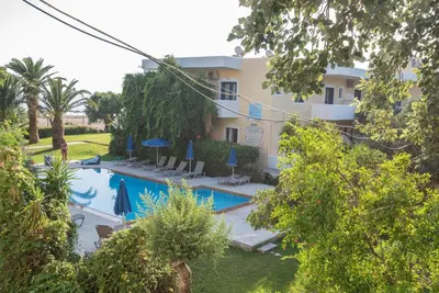 an aerial view of a resort with a swimming pool at On the sand 1 in Palaiochóra