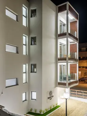 a facade of a building with windows at Balance Hotel in Chania Town