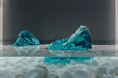 two blue rocks floating on top of water at Mirabile Luxury Suites in Chania Town