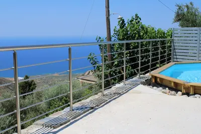 a swimming pool on the side of a house at INO II Domus POOL by Amigdalokefali Elafonissi in AmigdhalokeFálion