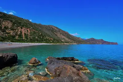 a view of a beach with rocks in the water at Bitsakis Family II - Paleochora Luxury House in Palaiochóra