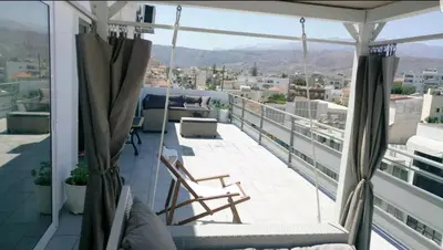 a balcony with a view of a city at Penthouse Apartment in Chania Heart in Chania Town