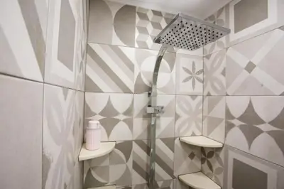 a bathroom with a shower and a toilet at Home with Terrace in Heart of old Town of Chania in Chania Town
