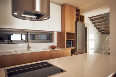 a kitchen with a sink and a counter top at Omnia Villas - 