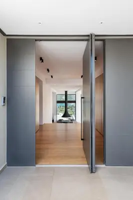 an open hallway with sliding doors in a house at Seametry Luxury Living Penthouse in Souda