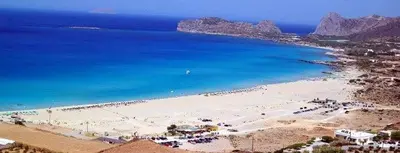 a beach with a lot of people and the ocean at Villa Stylianos retreat in Kissamos