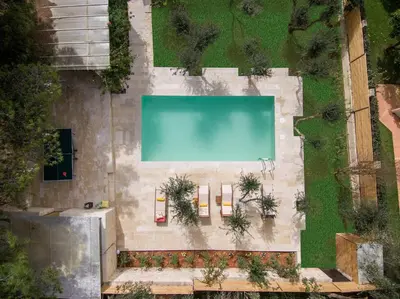 an overhead view of a swimming pool in a building at Luxury Crete Villa Villa Koukounari Private Pool Beautiful Scenery in Chania Town