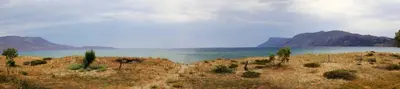 a view of a body of water with mountains at Zefyros Apartments and House in Kissamos