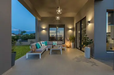 a living room with a couch and a table at Villa Vega I 