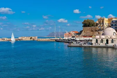 a harbor with a sail boat in the water at Comfy Apartment in Chania Town