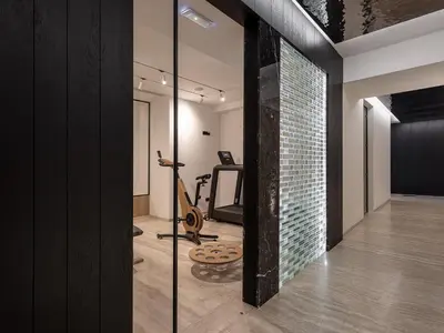 a room with a brick wall and a mirror at The Tanneries Hotel & Spa - a Member of Design Hotels in Chania Town