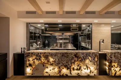a kitchen with a counter top in a room at The Tanneries Hotel & Spa - a Member of Design Hotels in Chania Town