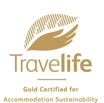 a logo for the international committee for coordination of organisations for accountability at Caldera Village in Agia Marina Nea Kydonias