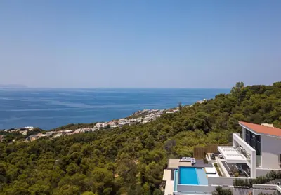 an aerial view of a building on a hill at Regal Residence in Chania Town