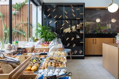 a bakery with many different types of pastries on display at Sapphire Horizon Suites in Kissamos