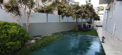 a backyard with a pool of water next to a building at BLUE EYES VILLA in Chania Town