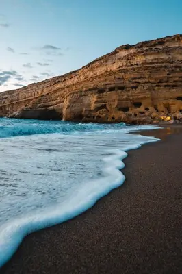 a beach with the ocean and a cliff at Chania Paradise Retreat - Falasarna Villa Nostalgia in Plátanos