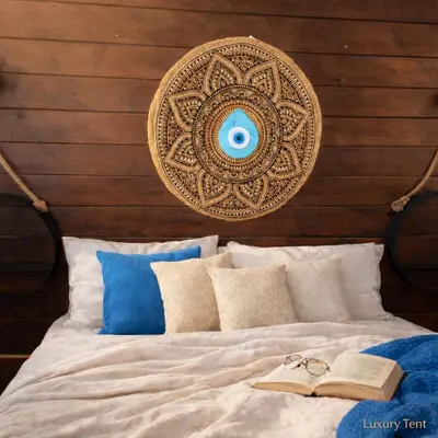 a bed with a wooden headboard with two books on it at dream tiny house & luxury tent, 6 km from center Chania in Chania Town