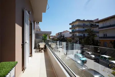 an apartment balcony with a view of a street at Chrissula apt Homeleader in Chania Town