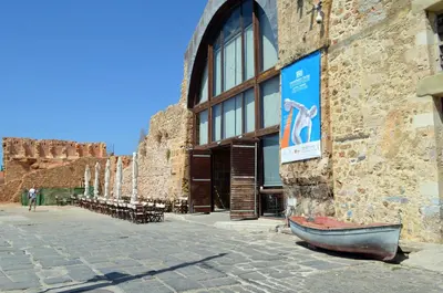 a building with a boat on the side of it at Casa Livieres in Chania Town