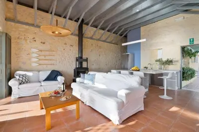 a living room with two white couches and a table at Villa Mediterranea - Heated Pool optional in Livadia