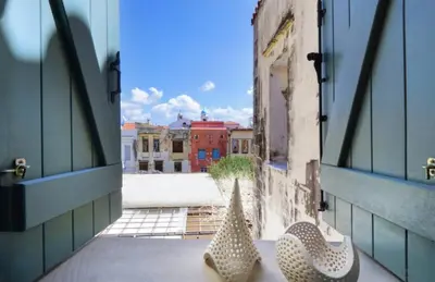a view from a window of a building with shoes at Character House in the Heart of Chania Old town in Chania Town