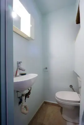 a bathroom with a sink and a toilet at Character House in the Heart of Chania Old town in Chania Town