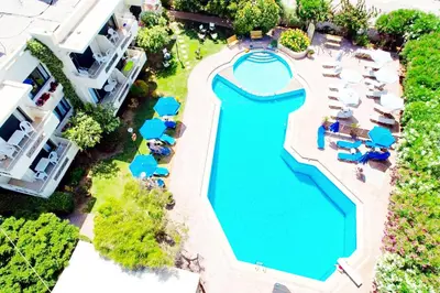 an overhead view of a swimming pool at a resort at Lili Apartments,oasis 2,5 km from Hania center in Parigoría