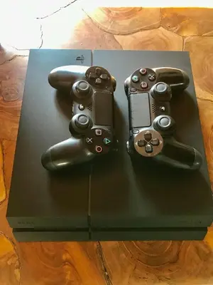 two video game controllers sitting on top of a table at Villa Elena - Private Villa in the heart of nature in Chania Town
