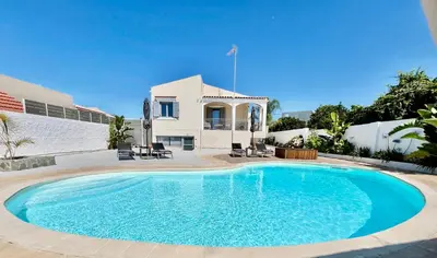 a large swimming pool in front of a house at Villa Elena - Private Villa in the heart of nature in Chania Town