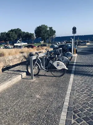a group of bikes parked next to a street at DIONI in Chania Town