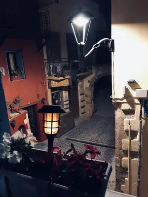 a street light and a table in a room at DIONI in Chania Town