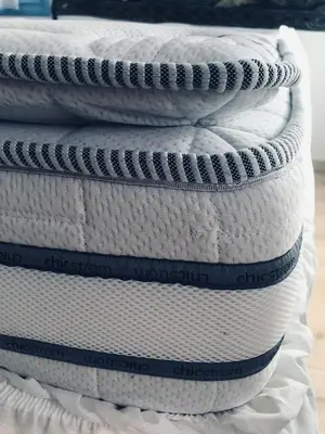 a stack of white towels stacked on top of each other at DIONI 2 in Chania Town