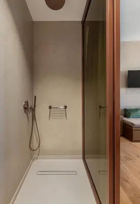 a shower with a glass door in a bathroom at Anassa Chania Boutique Hotel in Chania Town