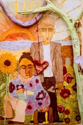 a painting of a man and a woman at Tasoula's Beachside Rooms in Palaiochóra