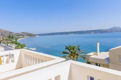 a view of the ocean from a building at Kalyves Bay in Kalyves