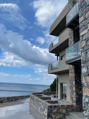 a house with a view of the ocean at panorama new generation in Sfakiá